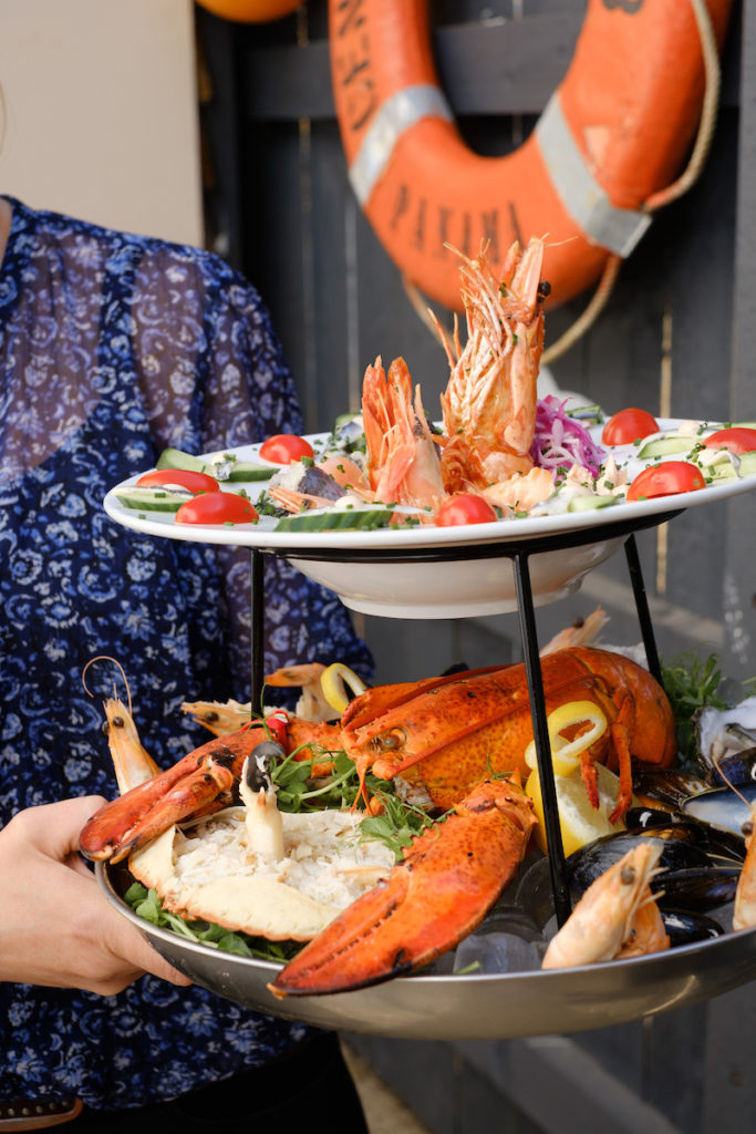 Humber Fish Company © 2019 Neil Holmes Photography - A seafood platter from Humber Fish Co., beautifully presented with a variety of fresh seafood, including oysters, prawns, mussels, and crab. The dish showcases the restaurant’s focus on high-quality, locally sourced ingredients