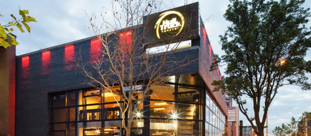 Exterior of Hull Truck Theatre, a modern building with large glass windows and bold signage. The contemporary venue is known for its dynamic performances and contributions to Hull’s vibrant arts scene.