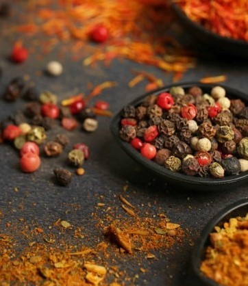 Various spices arrange on black surface