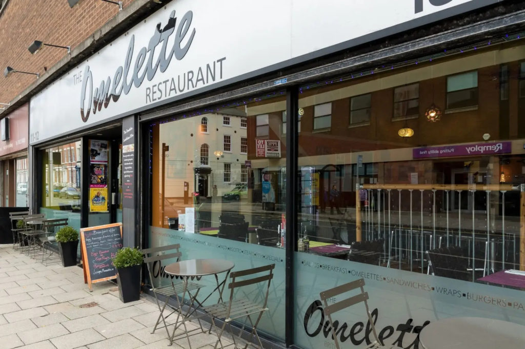 Exterior of Omelett restaurant in Hull, a modern eatery with stylish signage and a welcoming entrance. The contemporary facade reflects the restaurant’s focus on fresh, creative cuisine