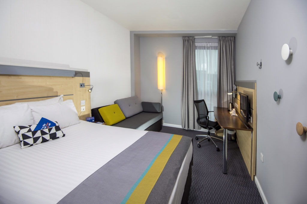 Hotel bedroom showing the bed and sofa bed.