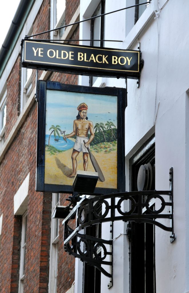 A sign about Ye Olde Black Boy in Hull, providing historical information about the pub. The sign details its heritage, significance, and status as one of the city's oldest public houses