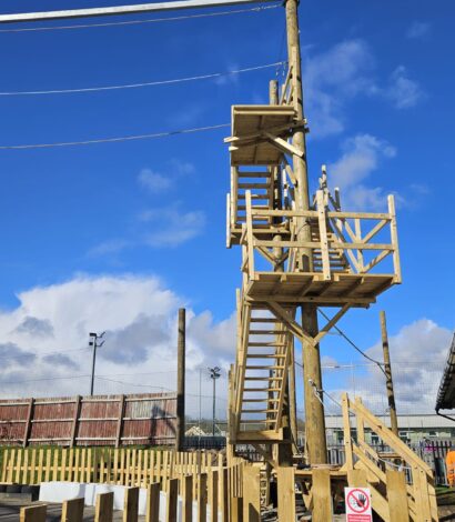 Large wood watchtower and part of highropes frame