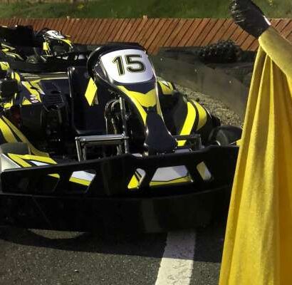 Go Karts on track and yellow flag